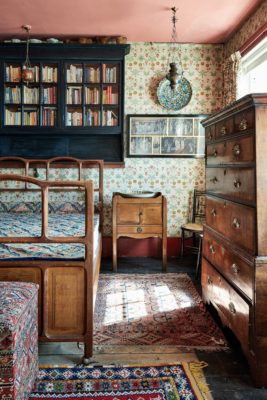 Cottage bedroom with pretty wallpaper