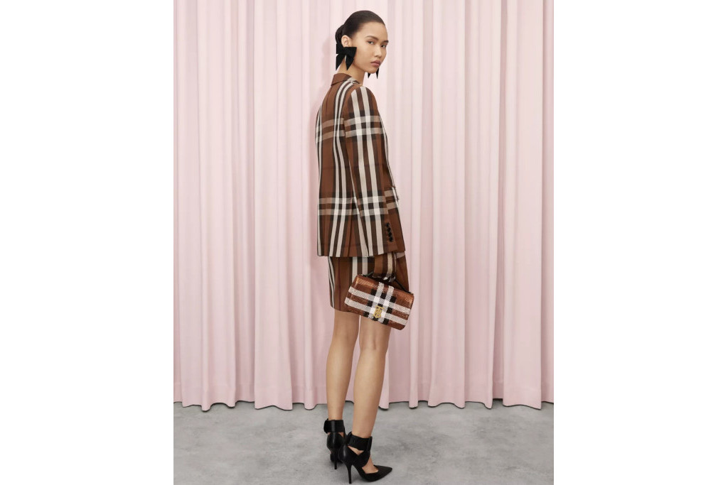 MNodel in check blazer and skirt