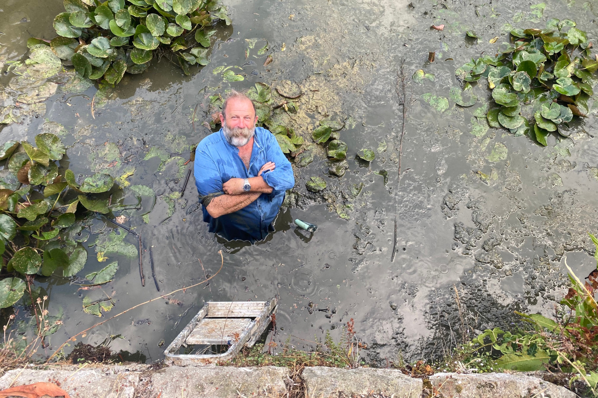 Dick Strawbridge in the chateau's moat