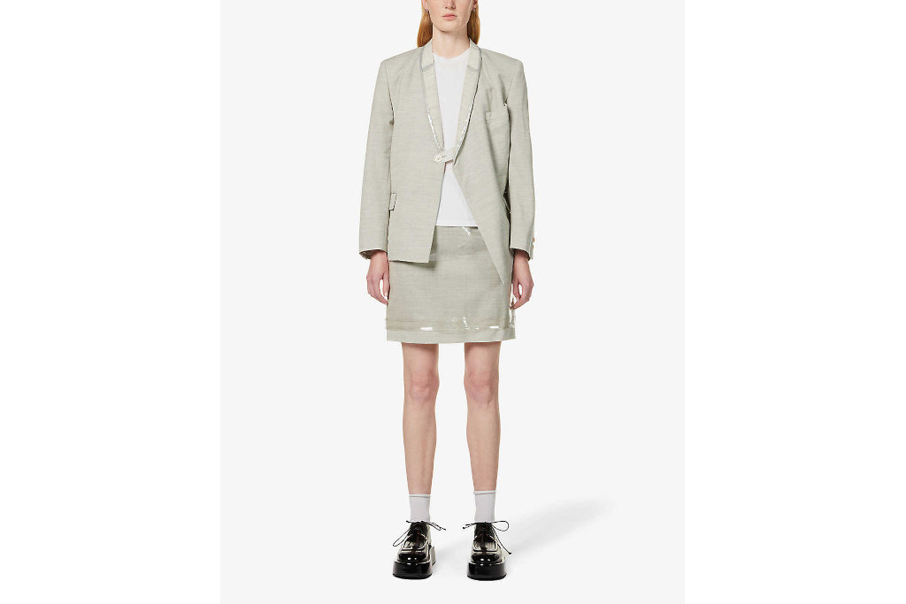 Model in light beige suit