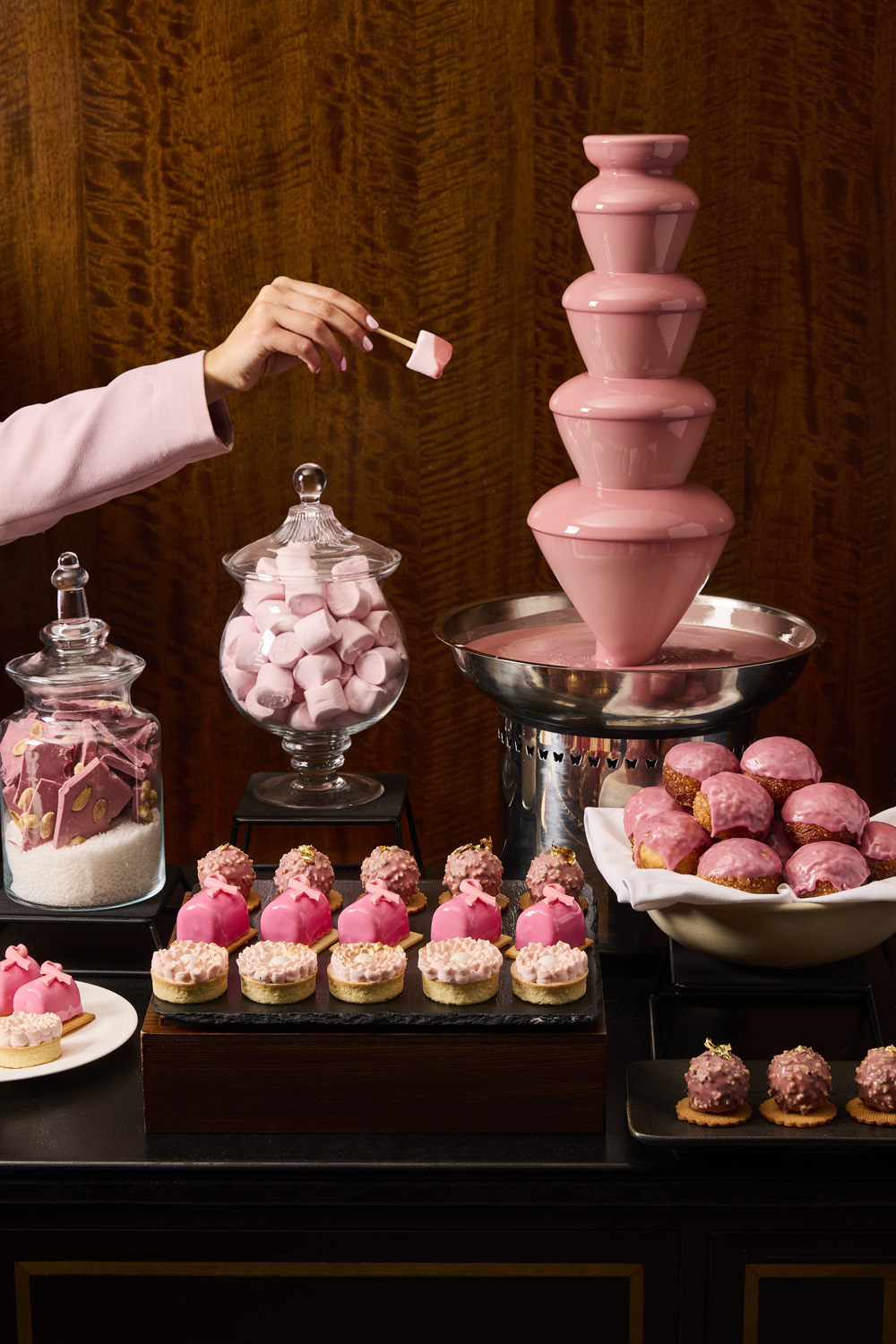 A pink chocolate fountain