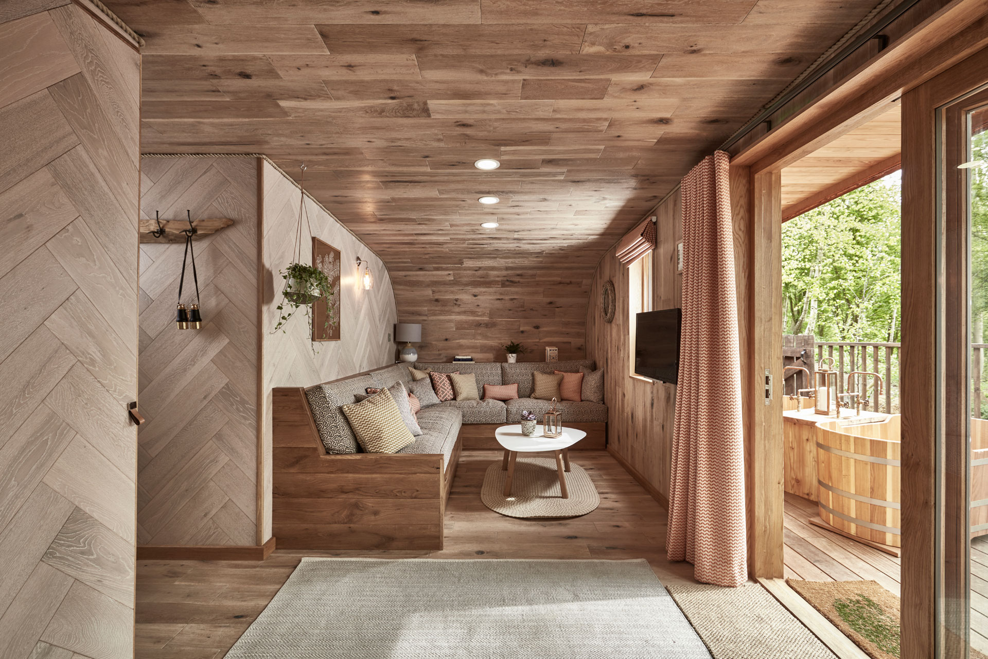 Wooden Lounge area with beige and cream features