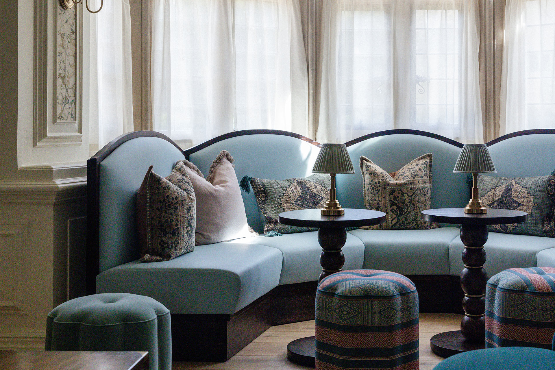 The living room at Kin House, with a blue sofa