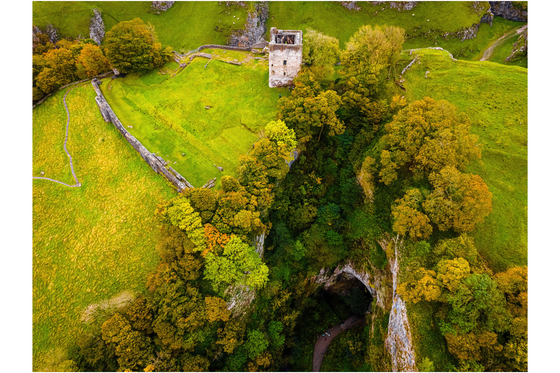 Aerial view of Peveril Castle ruins in Castleton in Peak District, England, UK