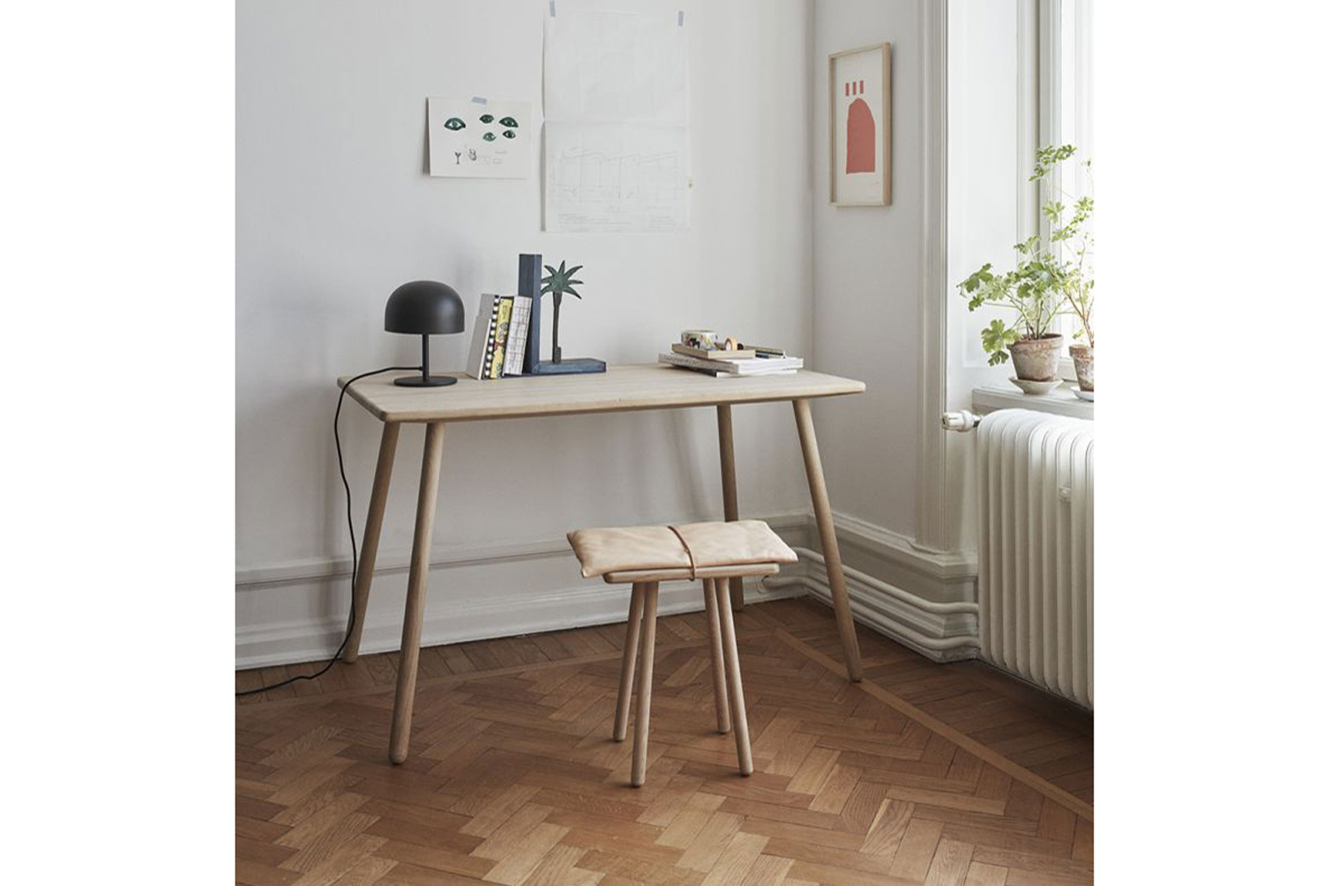 a wooden desk by The Conran Store