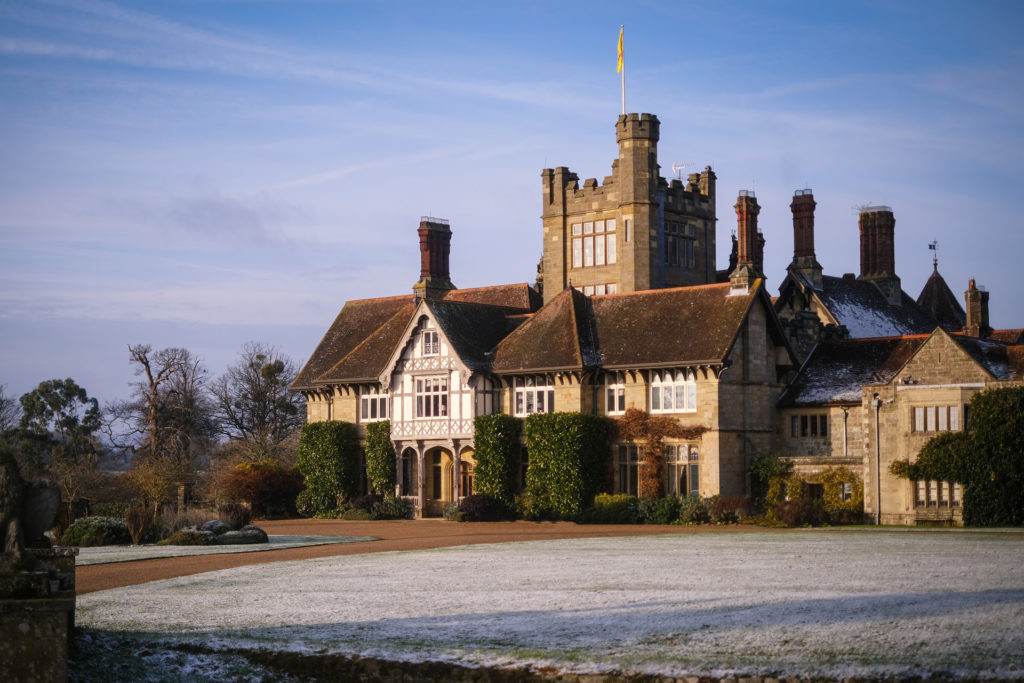 cowdray house with a frosty lawn