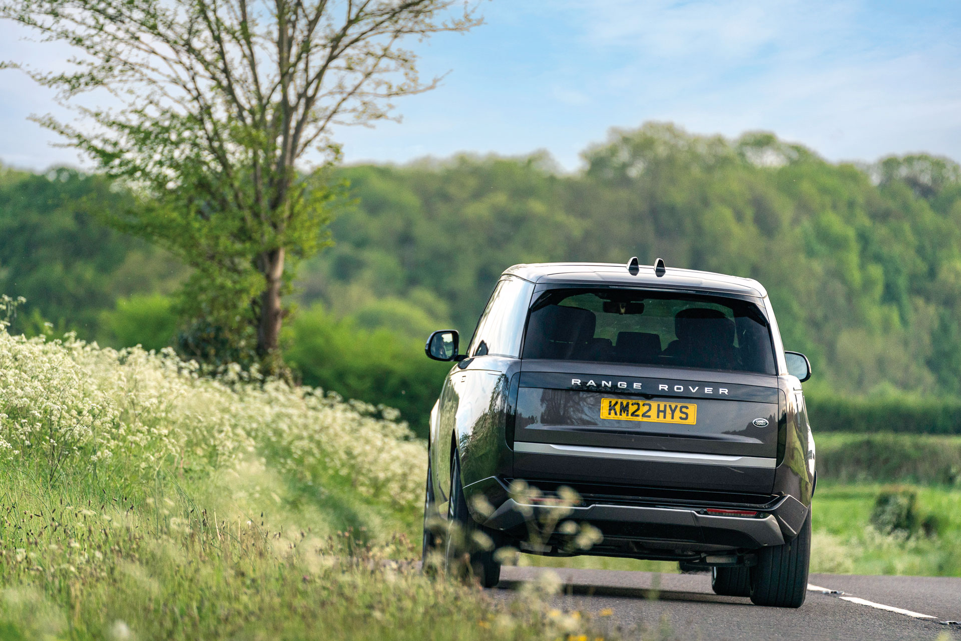 Range rover driving through countryside