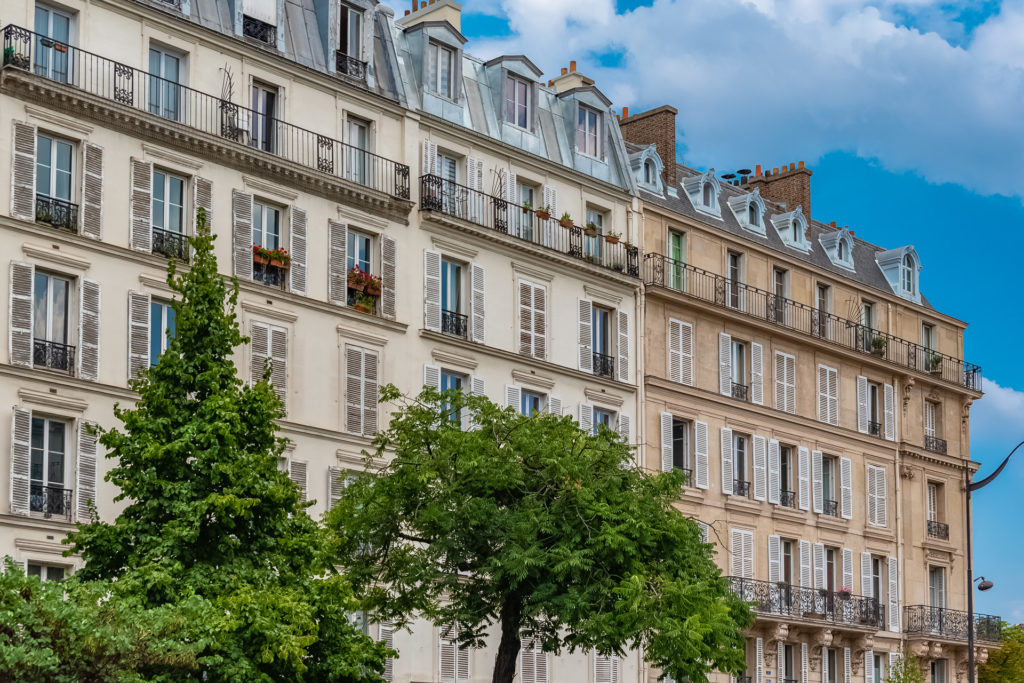 Paris, beautiful building in the center, typical parisian facade boulevard Voltaire