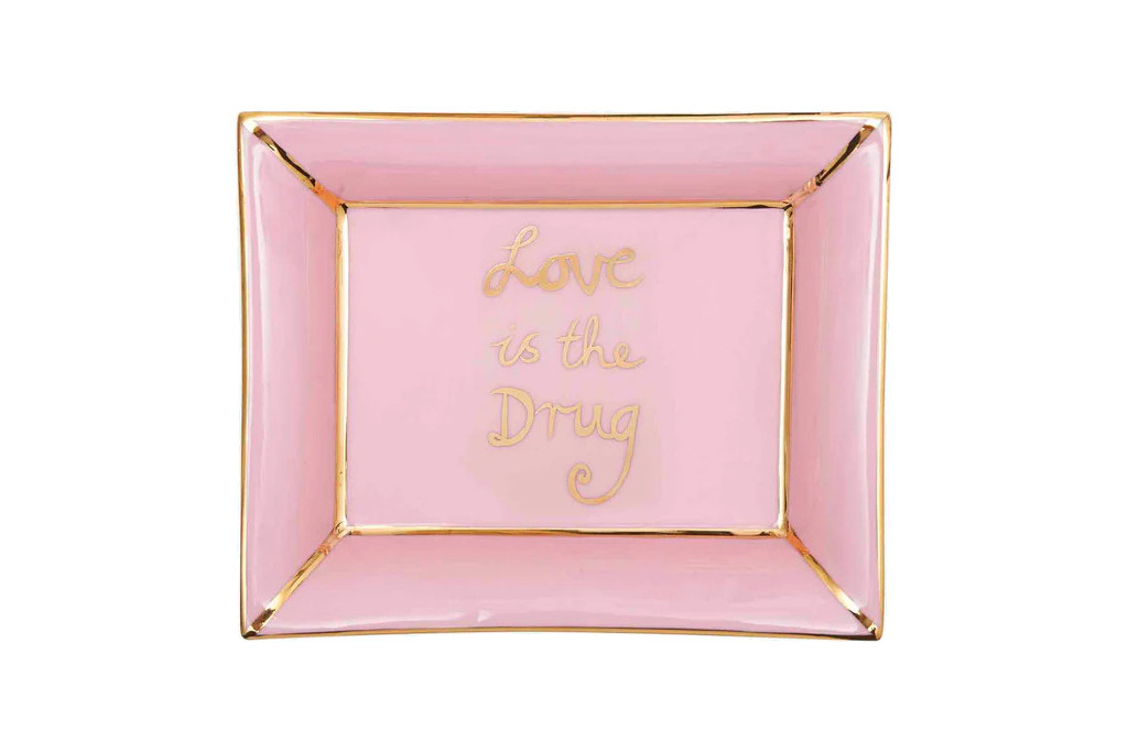 Pink tray with gold writing