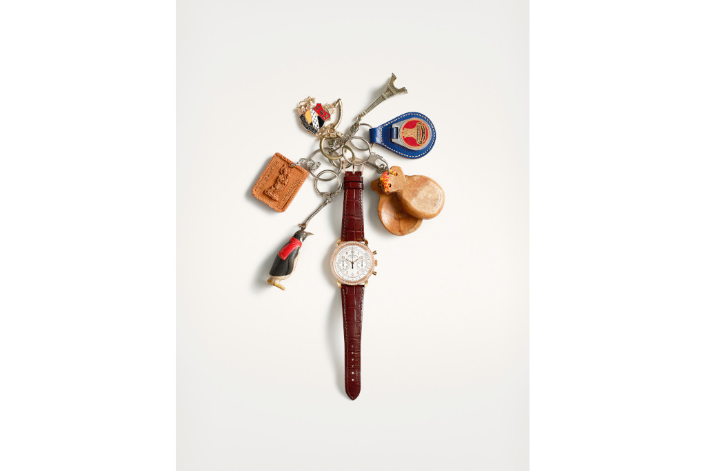 Key chains surrounding a watch