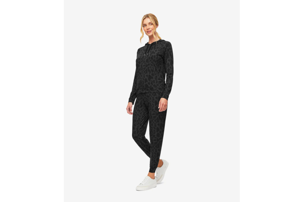 Woman in black leopard print set