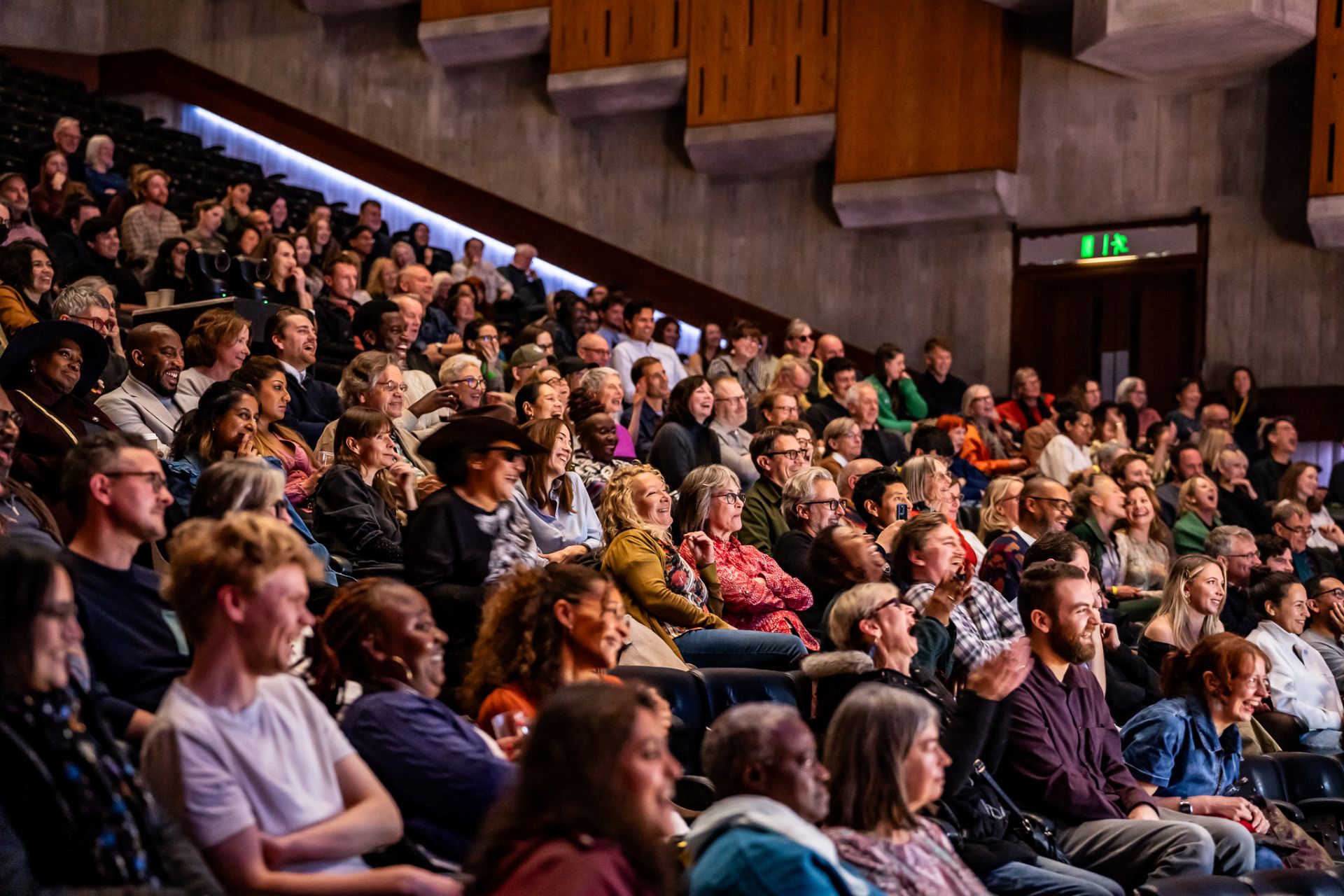 An audience inside a theatre in the Southbank Centre