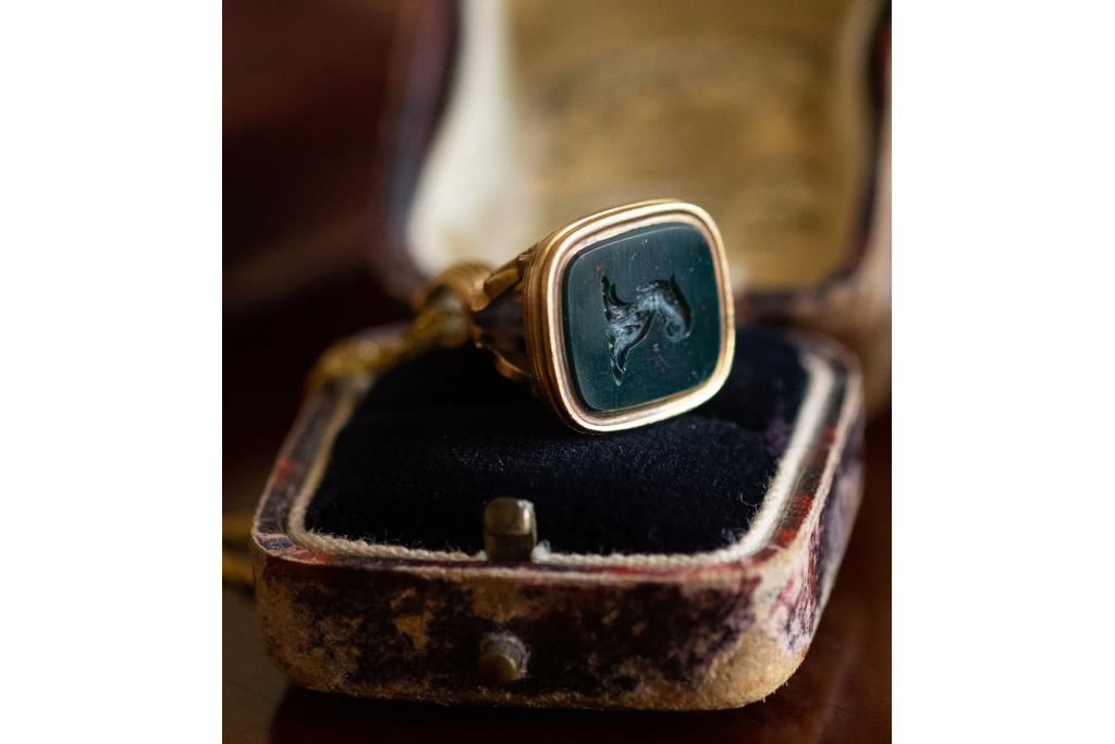 Close up of black agate phoenix ring