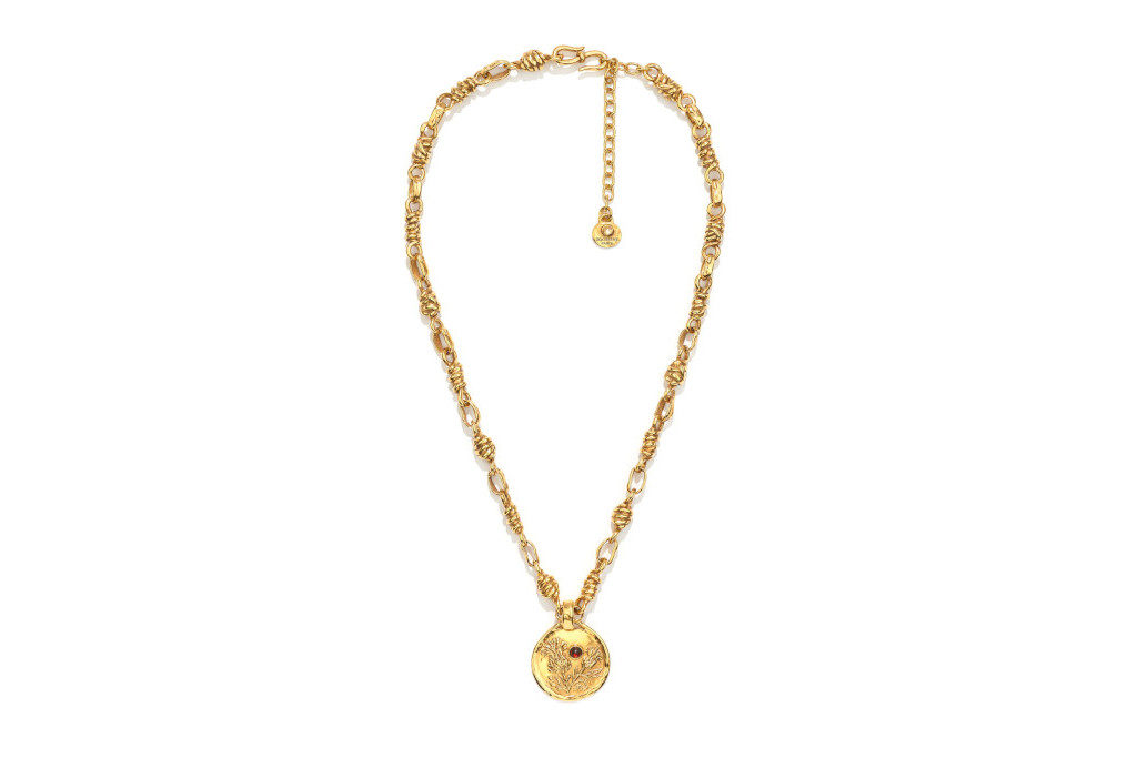 Gold medallion with thistle design