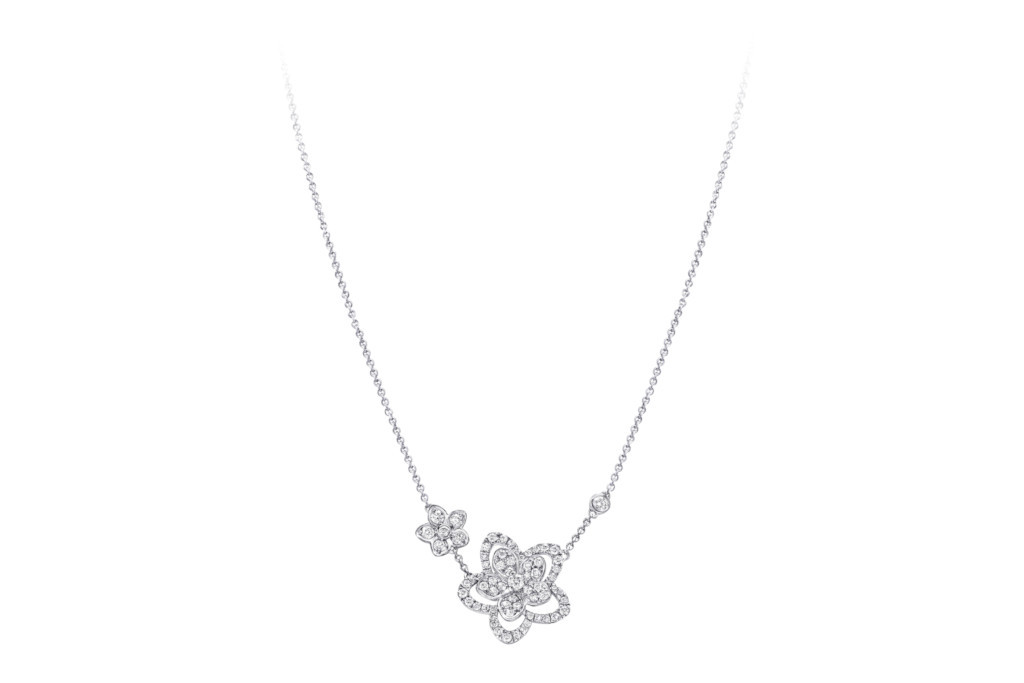 Silver flower pendant on chain