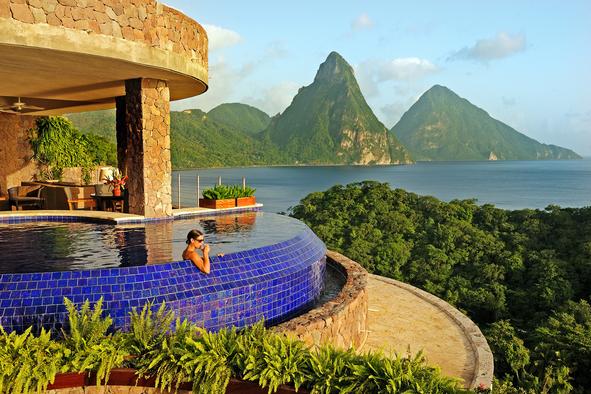 an infinity pool overlooking the caribbean sea