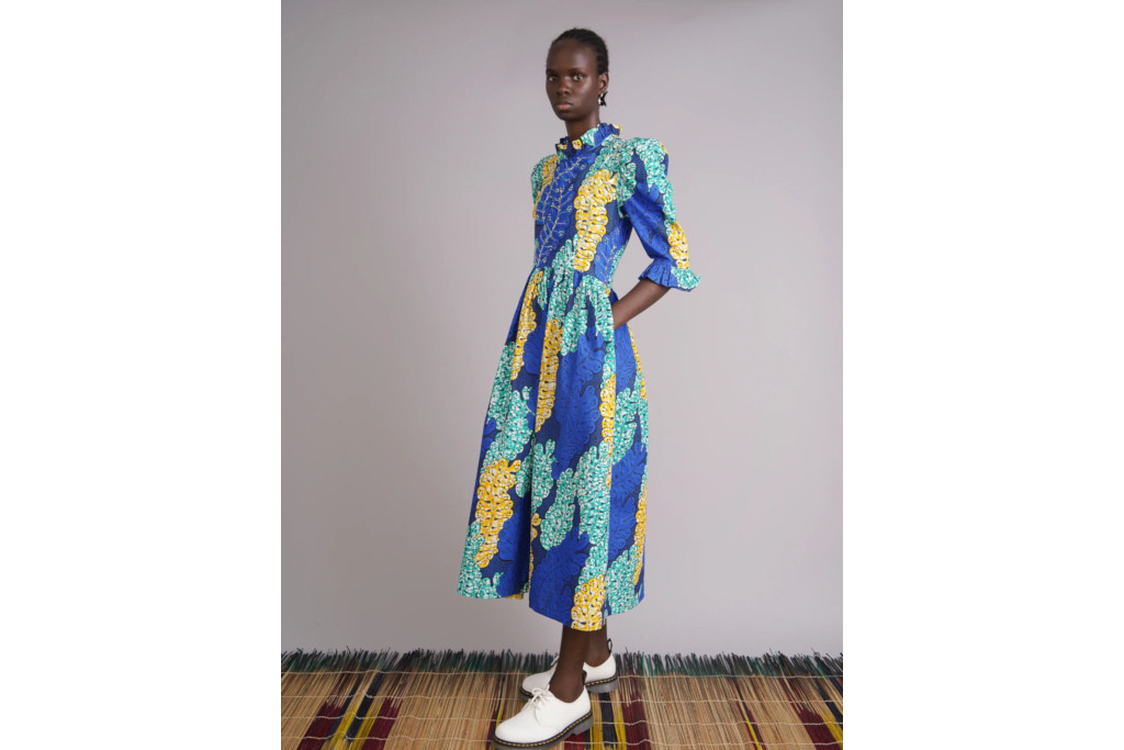Model in blue pattern dress