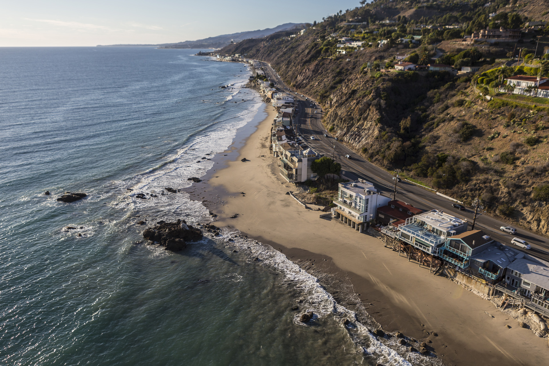 Aerial of homes along Pacific Coast Highway in Malibu California.