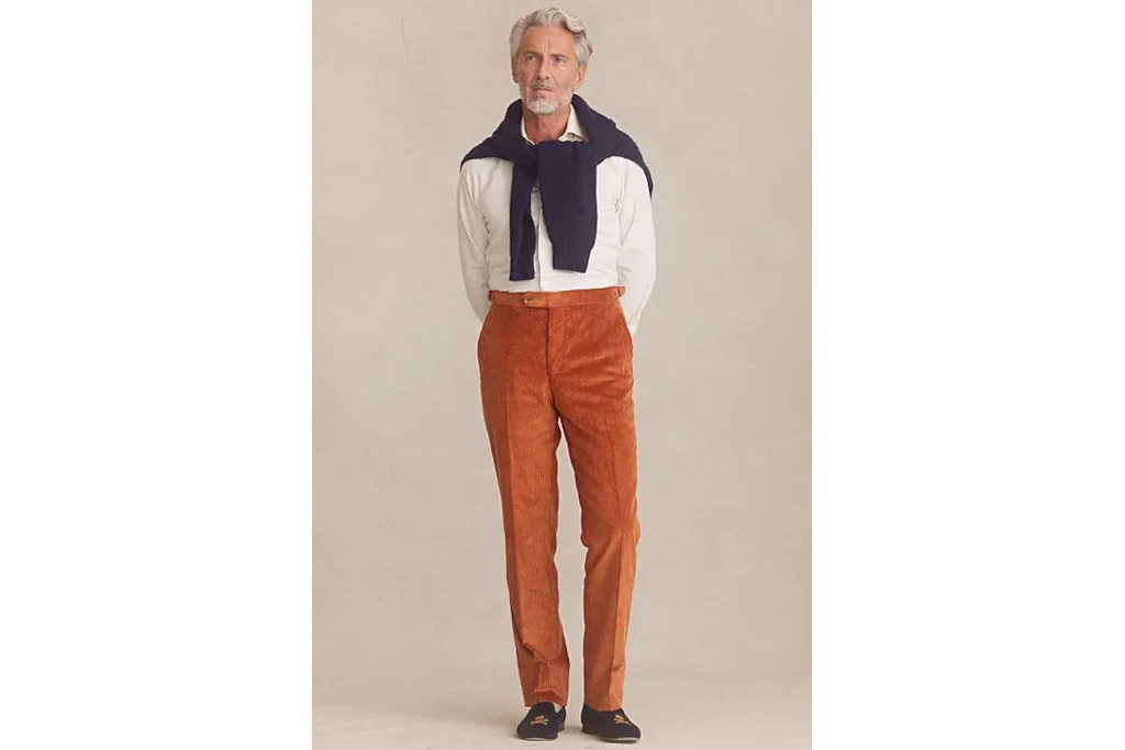 Man in orange corduroy trousers