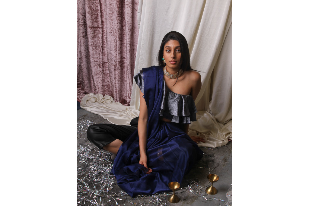 Nikita Ladwa sat down in a blue sari