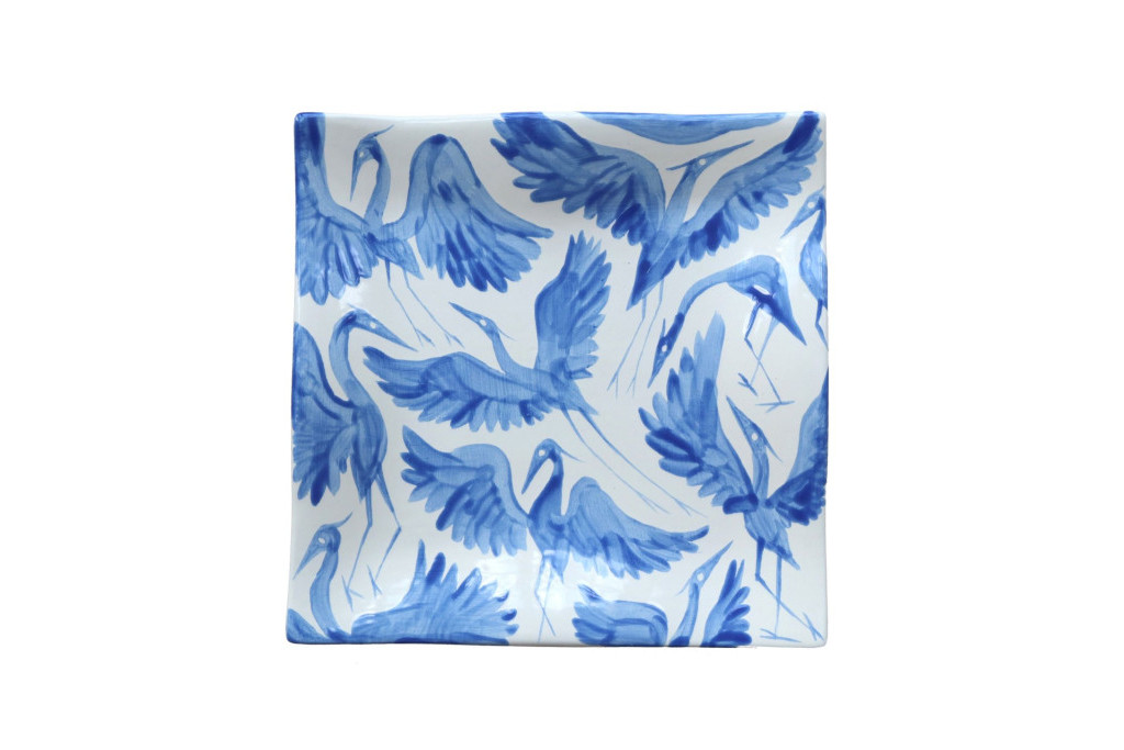 White square dish with blue herons