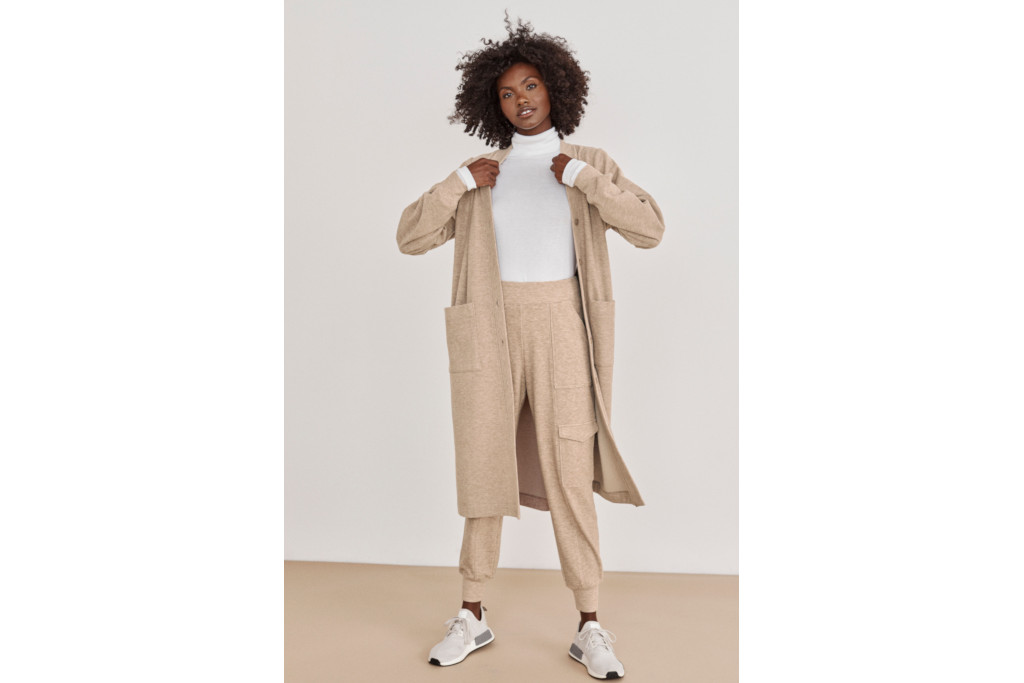Woman in beige cardigan and joggers