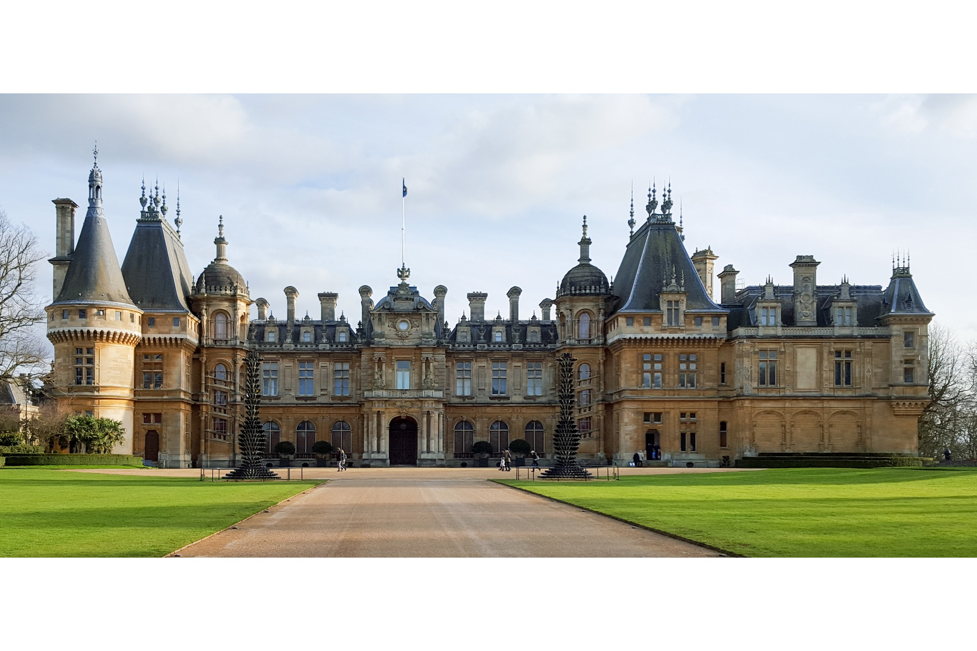 an expansive view of waddesdon manor, a large stately home