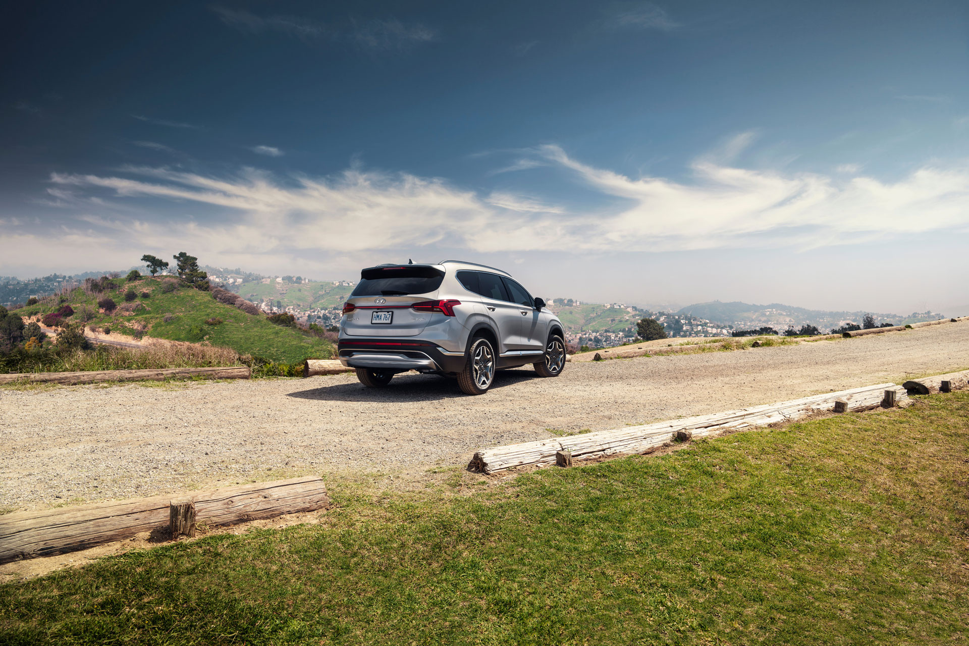 Rear view of the Hyundai Santa Fe Plug-in Hybrid in a field