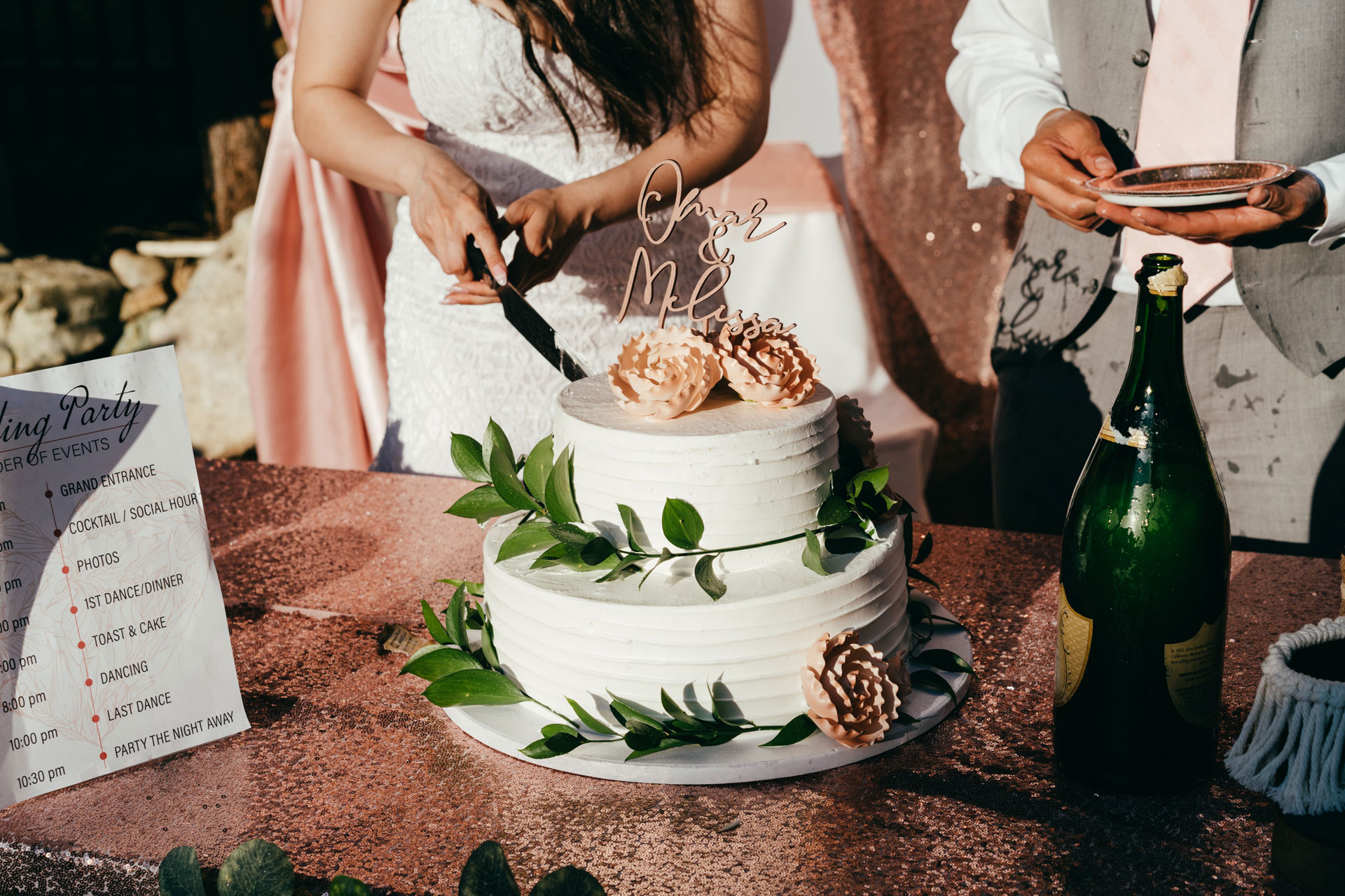 Couple cutting their wedding cake