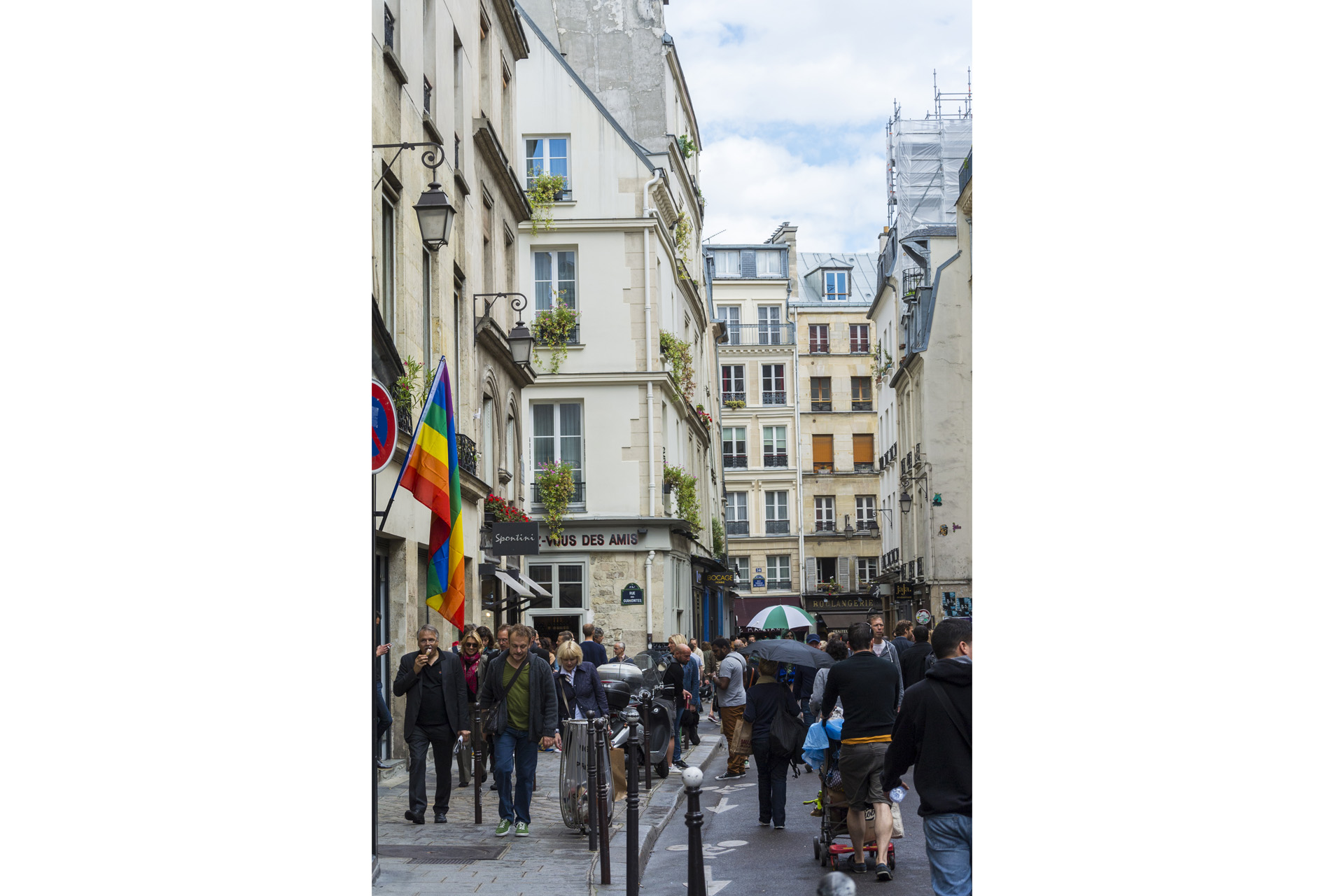 Daytime street scene in Marais district of Paris.