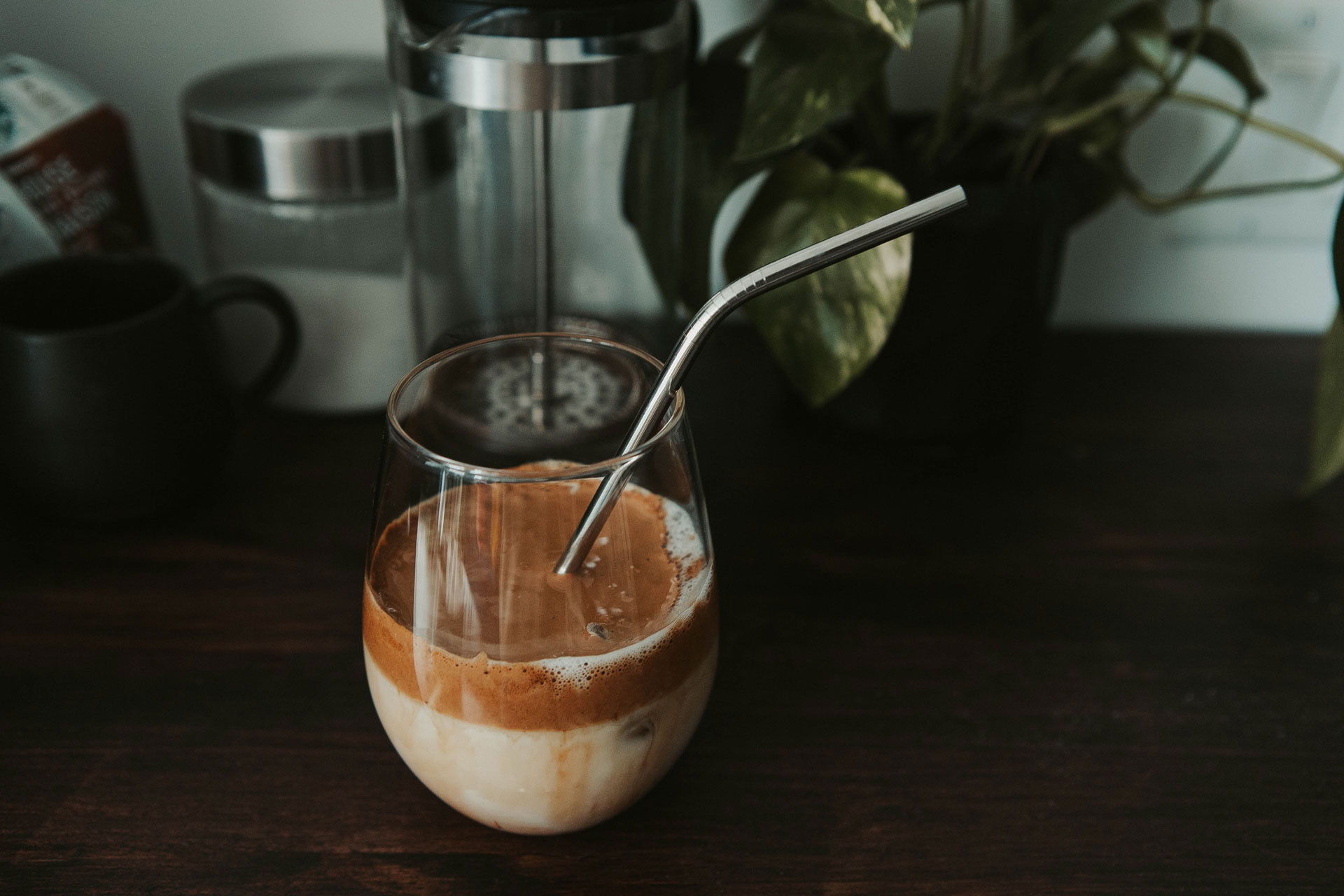 Iced coffee with metal straw