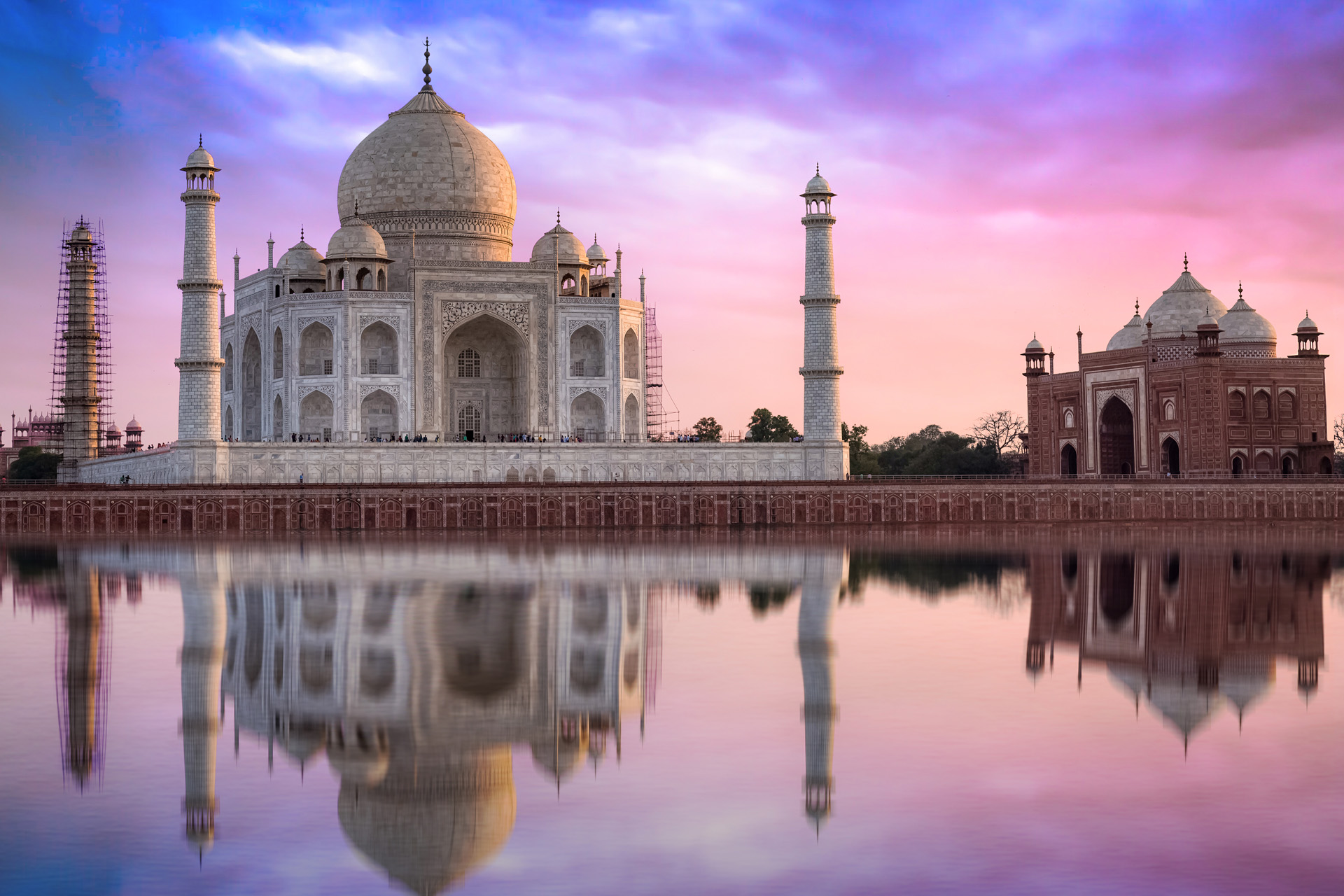 Taj Mahal is a white marble mausoleum on the banks of the Yamuna river built by Mughal Emperor Shah Jahan. A UNESCO World Heritage site at Agra, India.
