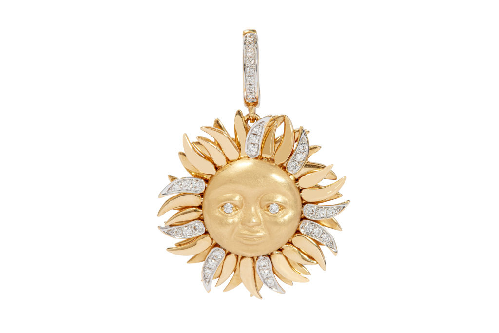 Gold sun charm