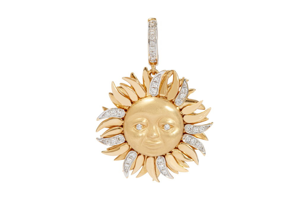 Gold sun charm