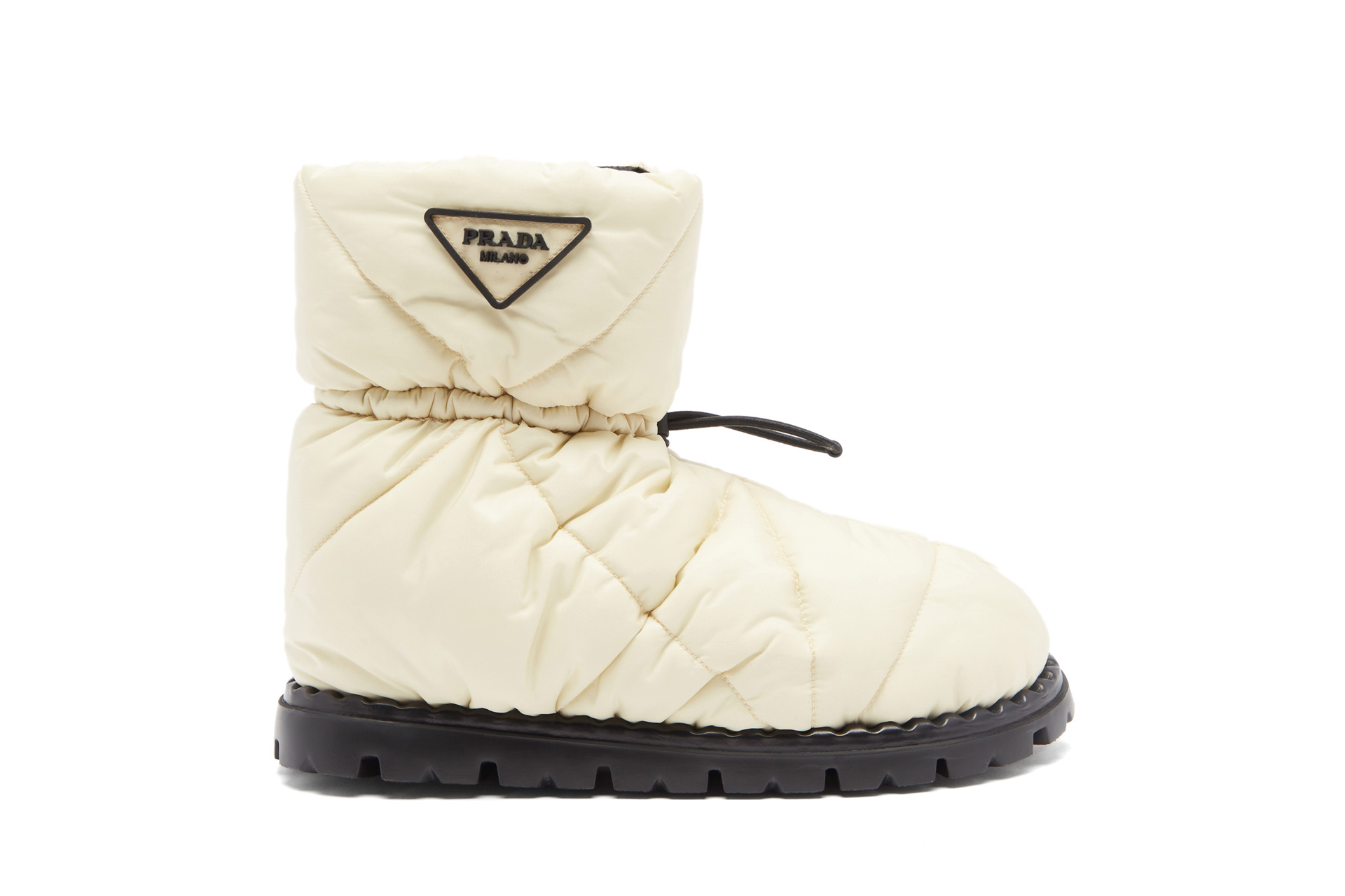 a cream snow boot