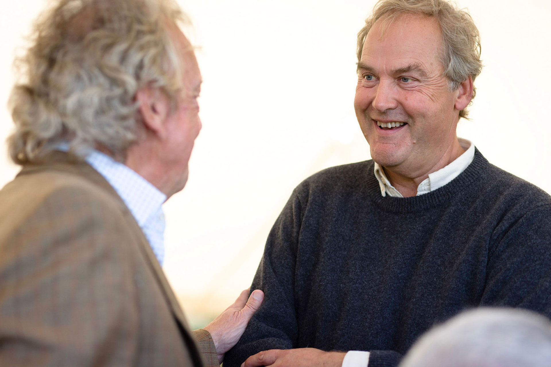 Harry Herbert shaking hands with man - Horses 