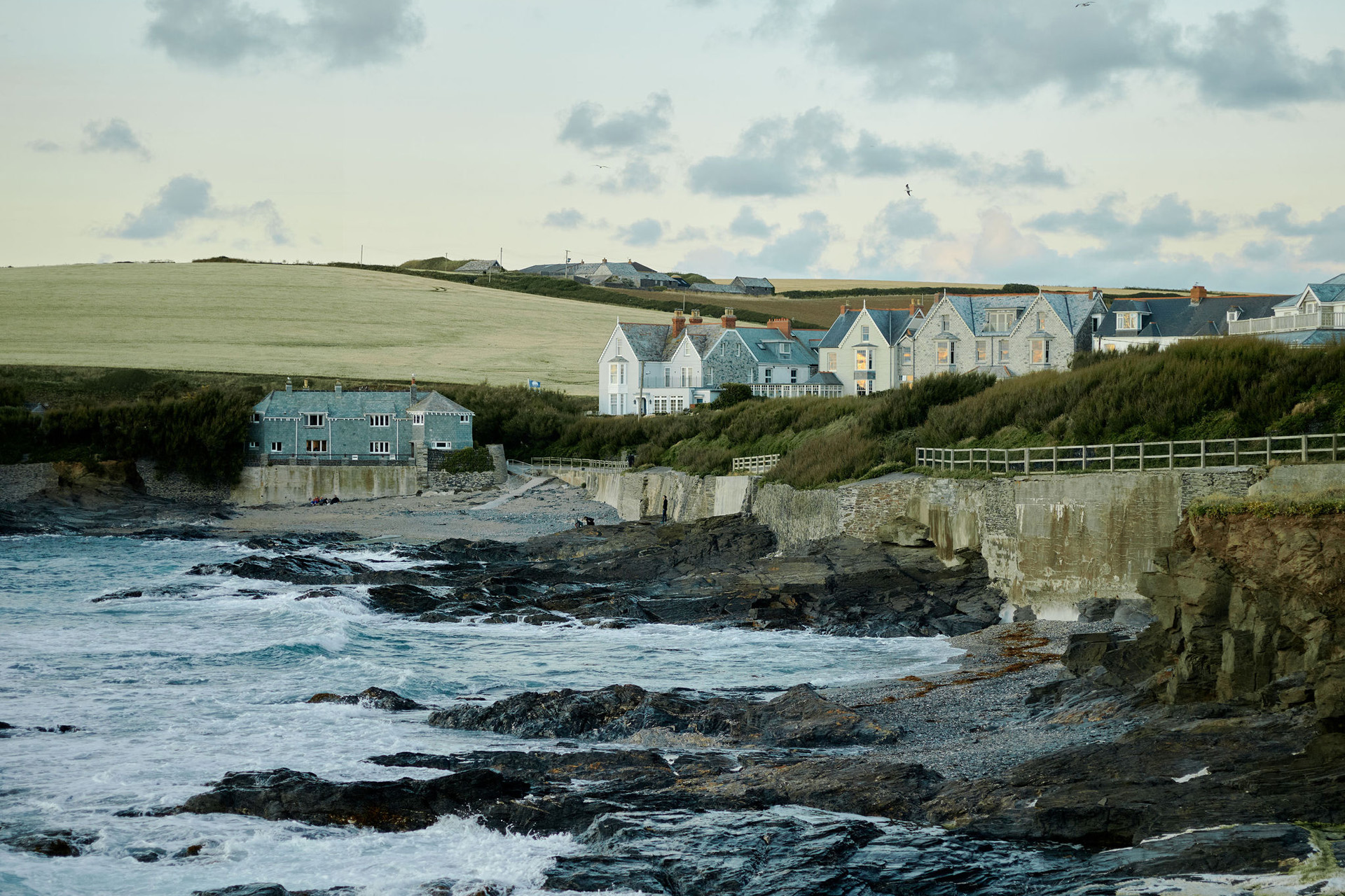 houses on the trevone bay coast in cornwall
