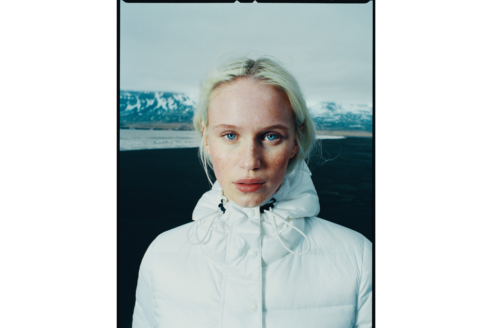 a blonde woman wearing the BELSTAFF Scooter coat,