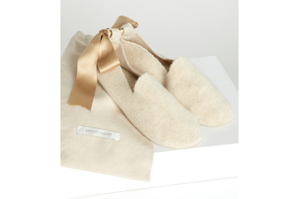 Slippers and bag on white box