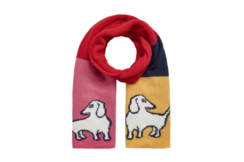 Multicoloured scarf with white dogs on it