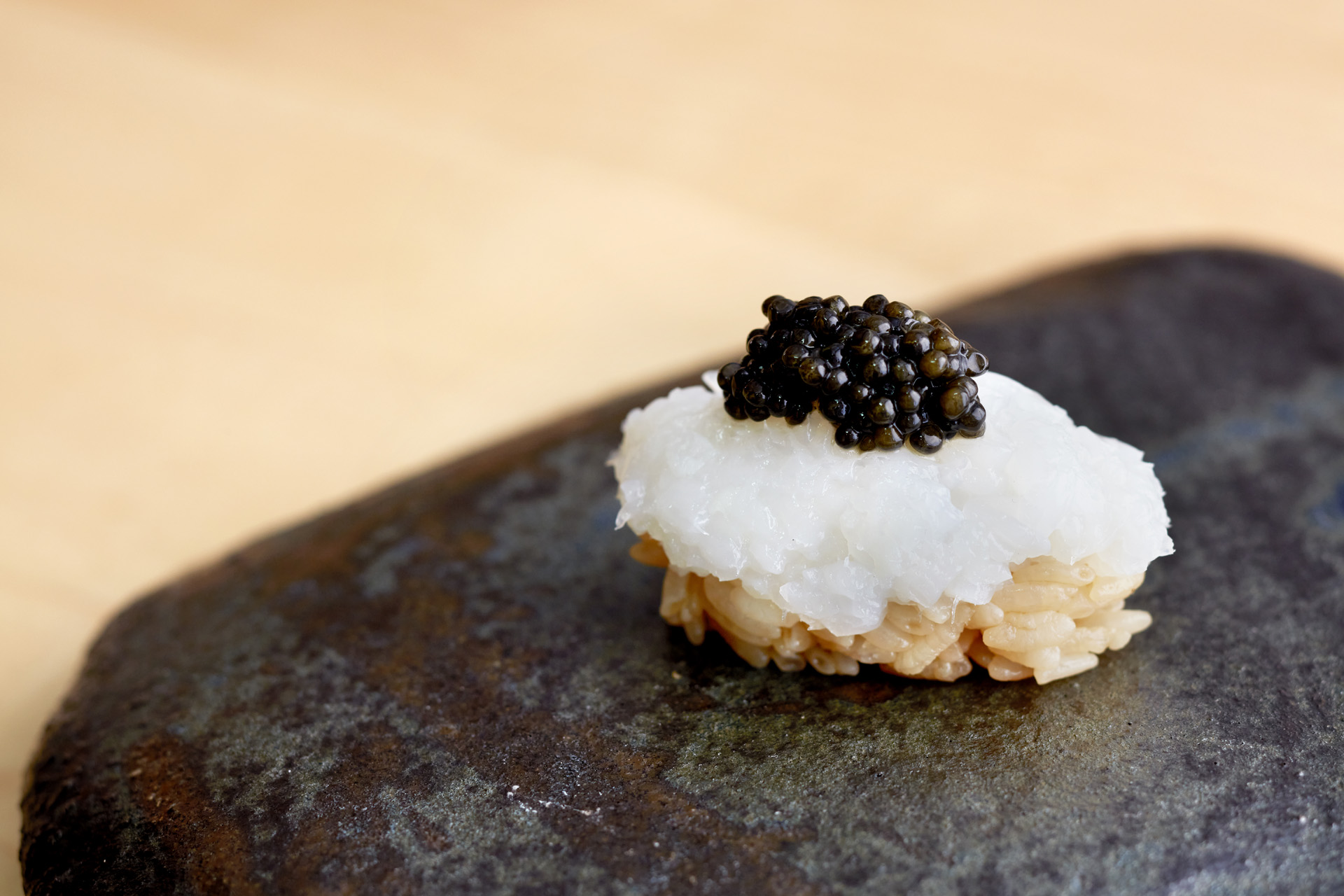 Exmoor Caviar Nigiri on a black rock