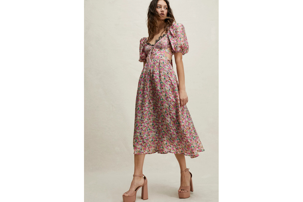Woman in pink floral dress