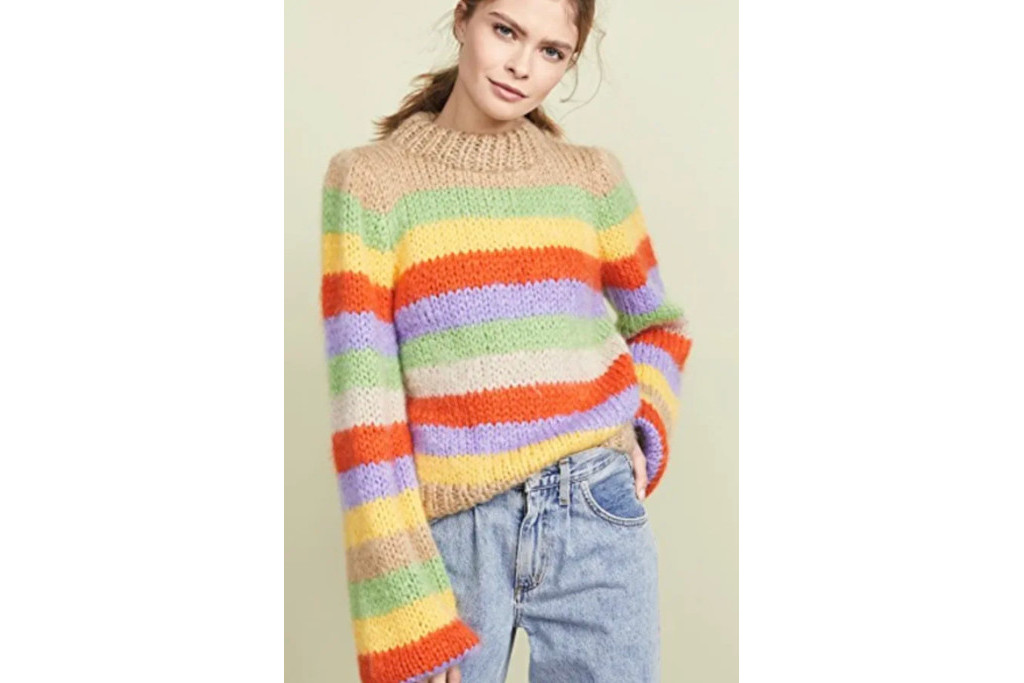 Woman in multi-coloured stripe jumper