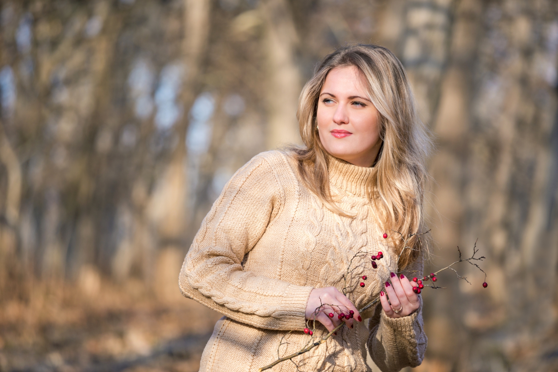 Woman outdoors wearing a sweater dress