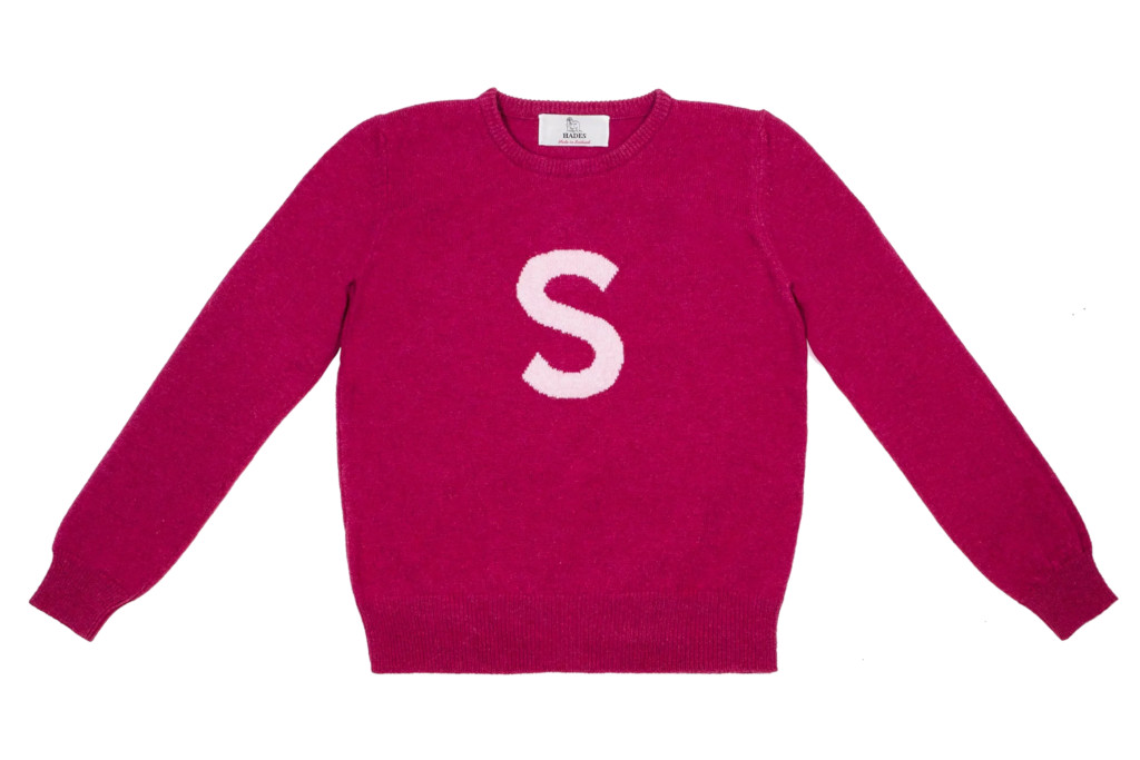 Dark pink jumper with light pink 'S' on the front