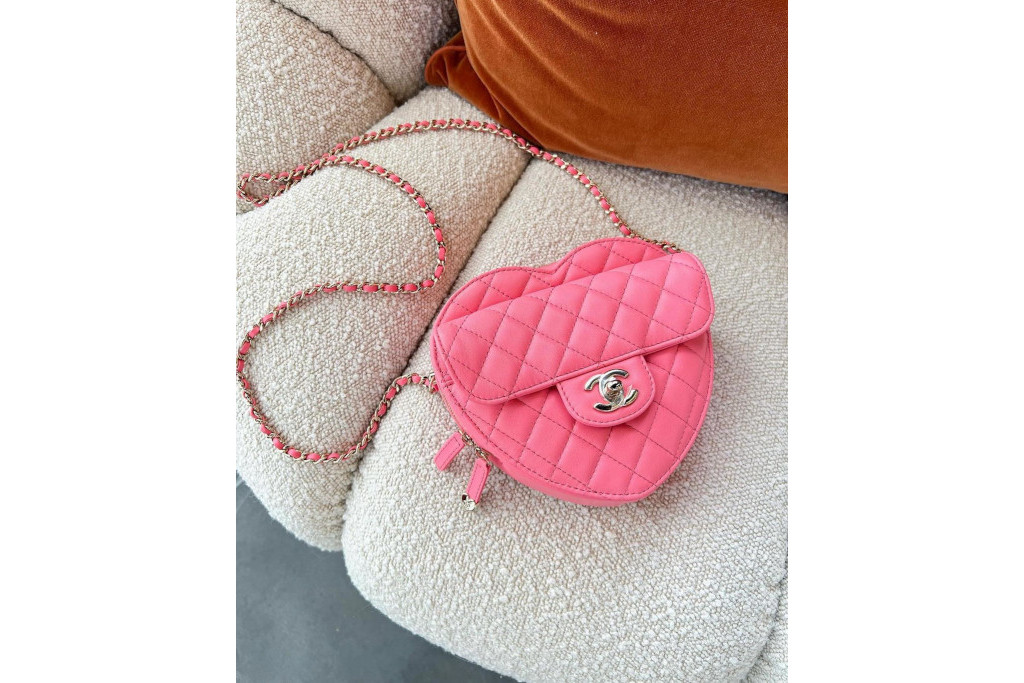 Pink heart bag on fluffy seat