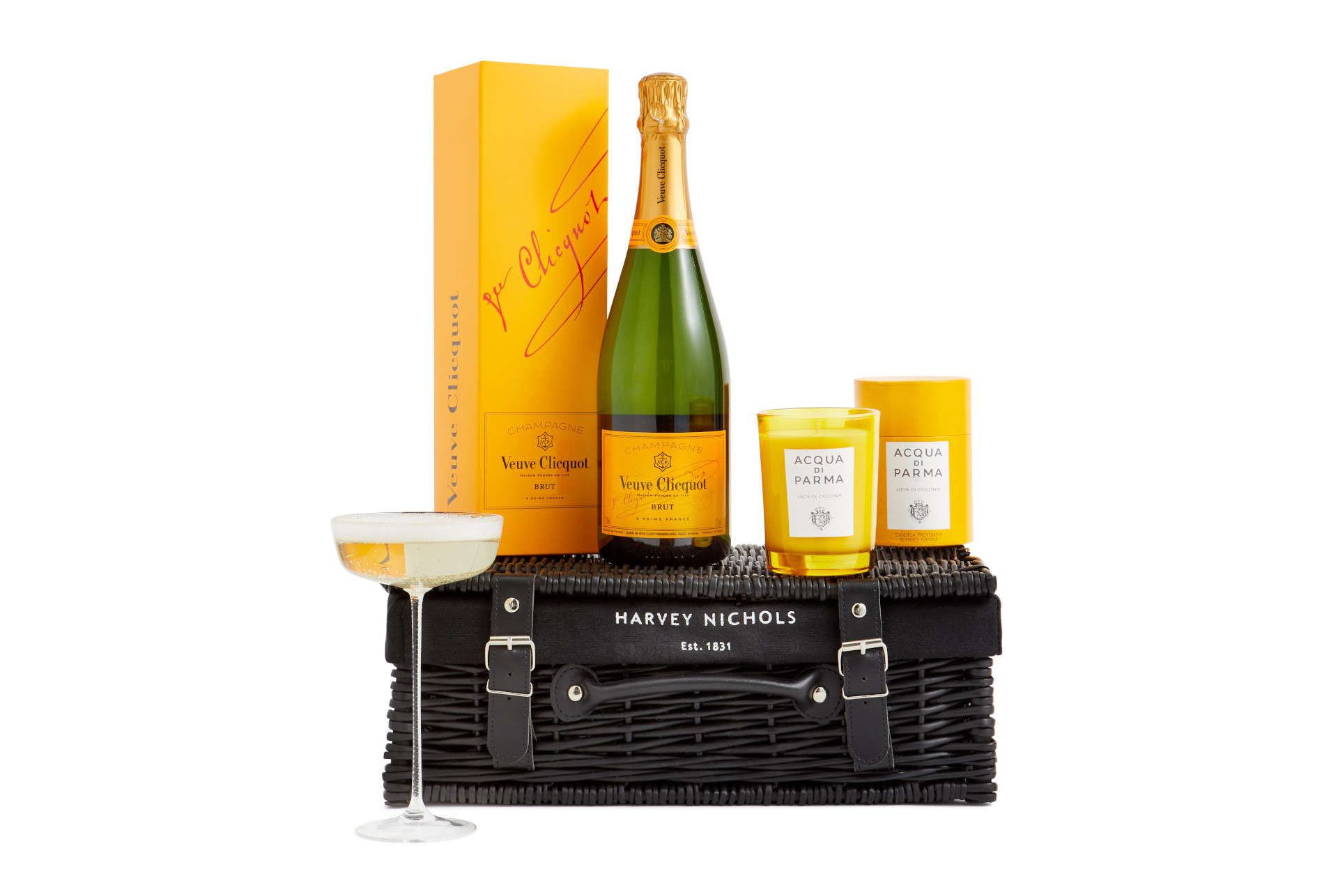 Hamper with champagne and candle