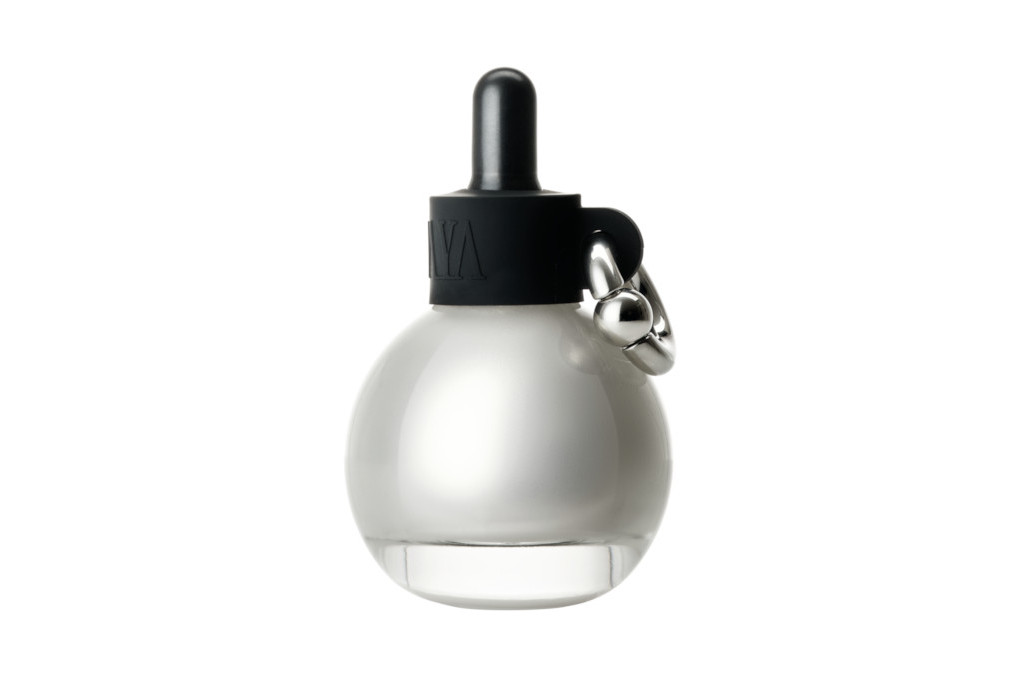 Silver bottle with black lid