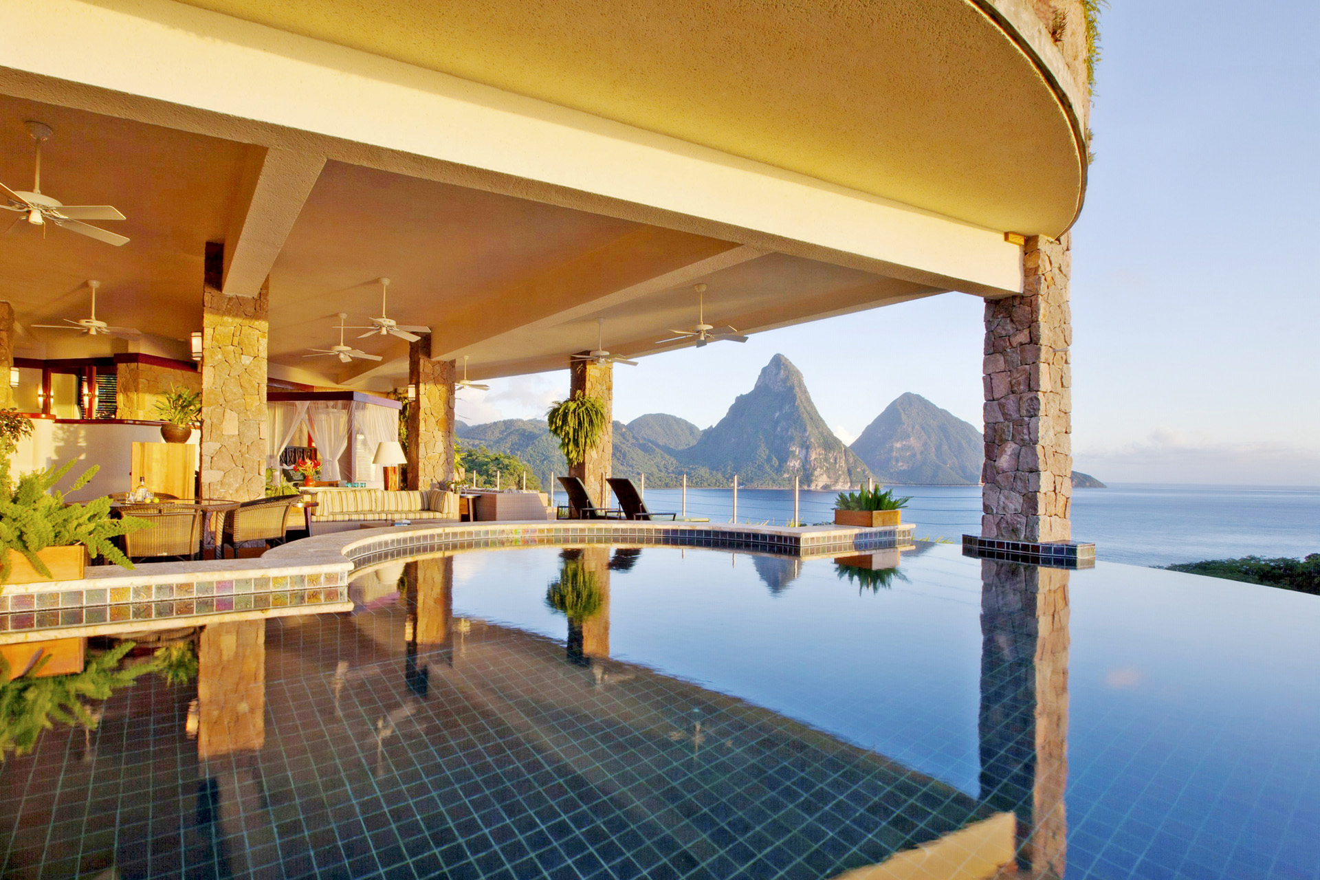 an infinity pool overlooking caribbean sea and piton mountains