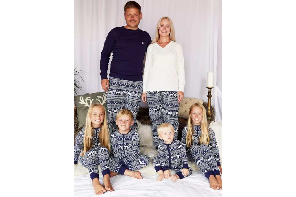 Family in navy pyjama sets